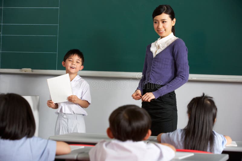 由Blackboard In中文选件类的学生和教师 库存照片