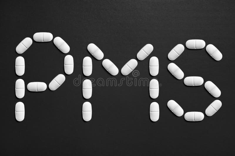 由药片做的PMS文本 库存照片 由药片做的PMS文本 库存照片