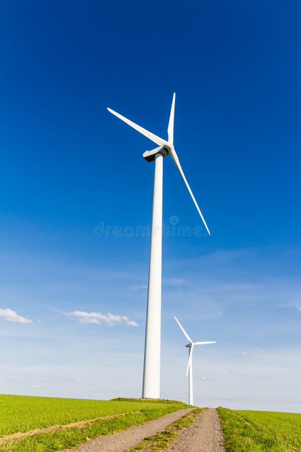 Wind turbine with blue sky - renewable energy. Wind turbine with blue sky - renewable energy