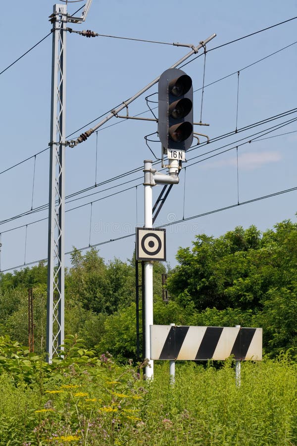 Electrified two-track railway line cutting through the industrial section of the town. Electrified two-track railway line cutting through the industrial section of the town.