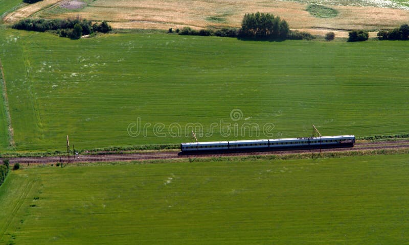 A diesel train engine on an electrified railroad. A diesel train engine on an electrified railroad