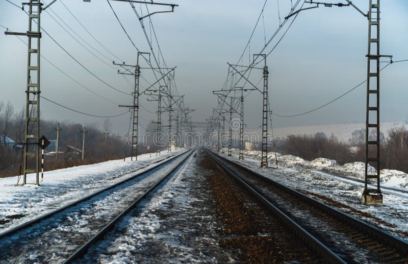 Electrified railway in the spring, which goes into the distance. Electrified railway in the spring, which goes into the distance.