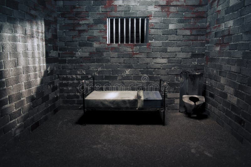 Dark and grungy prison cell at night. Dark and grungy prison cell at night