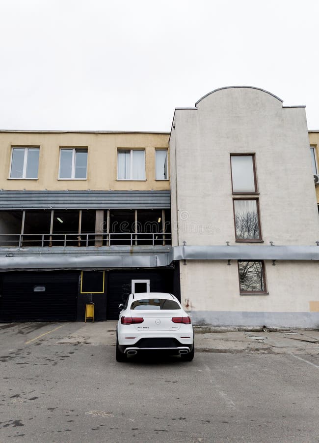 Minsk, Belarus, March 11, 2024 - Rear view of white mercedes-benz gls 300d 4matic of luxury flagship vehicles produced by the German automaker. Minsk, Belarus, March 11, 2024 - Rear view of white mercedes-benz gls 300d 4matic of luxury flagship vehicles produced by the German automaker