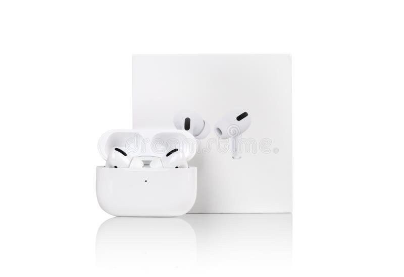 Rostov-on-Don, Russia - December 2019. Apple AirPods Pro on a white background. Wireless headphones in a charging case and a box close-up. Rostov-on-Don, Russia - December 2019. Apple AirPods Pro on a white background. Wireless headphones in a charging case and a box close-up