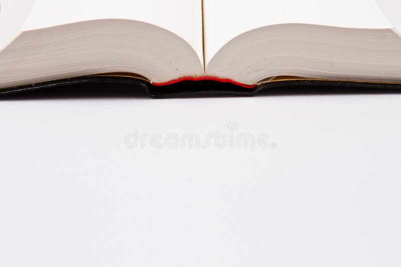Open book and school supplies with a path on a white background. You can change the background as you like. Open book and school supplies with a path on a white background. You can change the background as you like