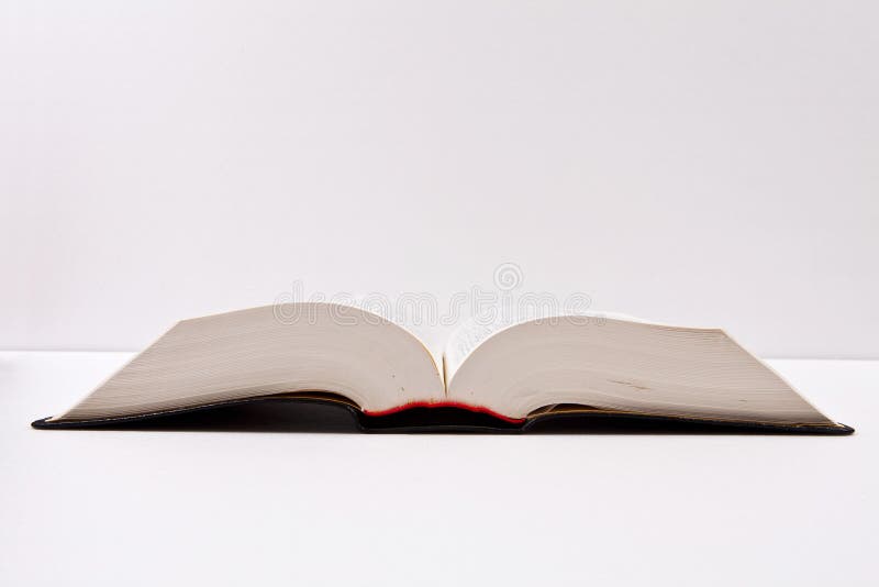 Open book and school supplies with a path on a white background. You can change the background as you like. Open book and school supplies with a path on a white background. You can change the background as you like