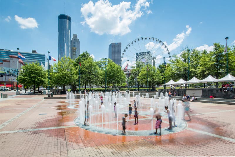 Kids play in the fountain in Centennial Olympic Park in downtown Atlanta. Kids play in the fountain in Centennial Olympic Park in downtown Atlanta