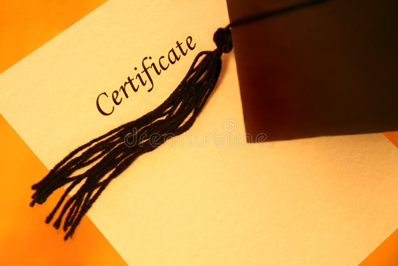 Certificate printed on a yellowish grainy textured paper and a black graduation cap on yellow-orange background, top view. Certificate printed on a yellowish grainy textured paper and a black graduation cap on yellow-orange background, top view