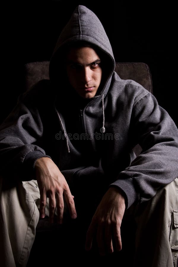 Young man with scary eyes, isolated on black. Young man with scary eyes, isolated on black