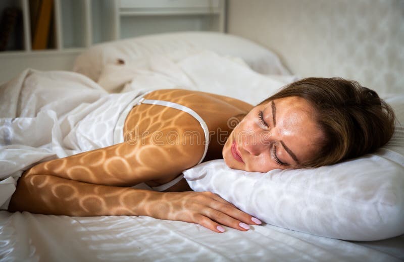 Portrait of young sleeping woman in bedroom. Portrait of young sleeping woman in bedroom