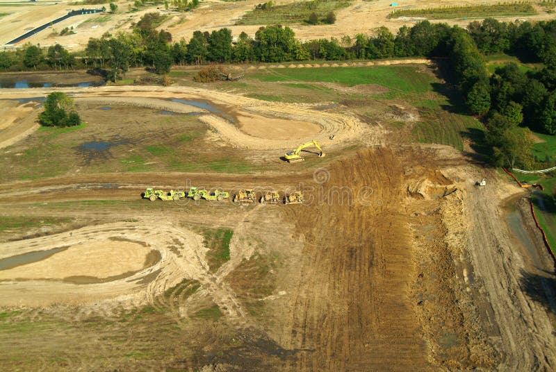 Aerial view from helicopter of construction and earthmoving. Aerial view from helicopter of construction and earthmoving.