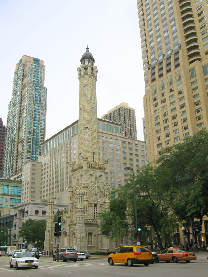 The famous old Water Tower of Chicago is nowadays dwarfed by the skyscrapers. The famous old Water Tower of Chicago is nowadays dwarfed by the skyscrapers.