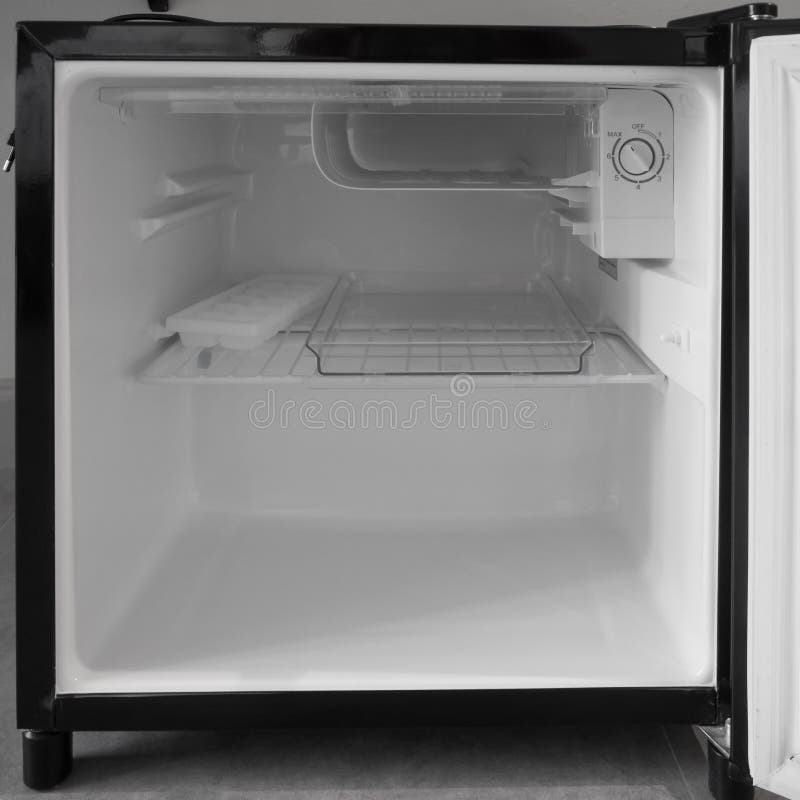 Image of Empty mini fridge. Image of Empty mini fridge.