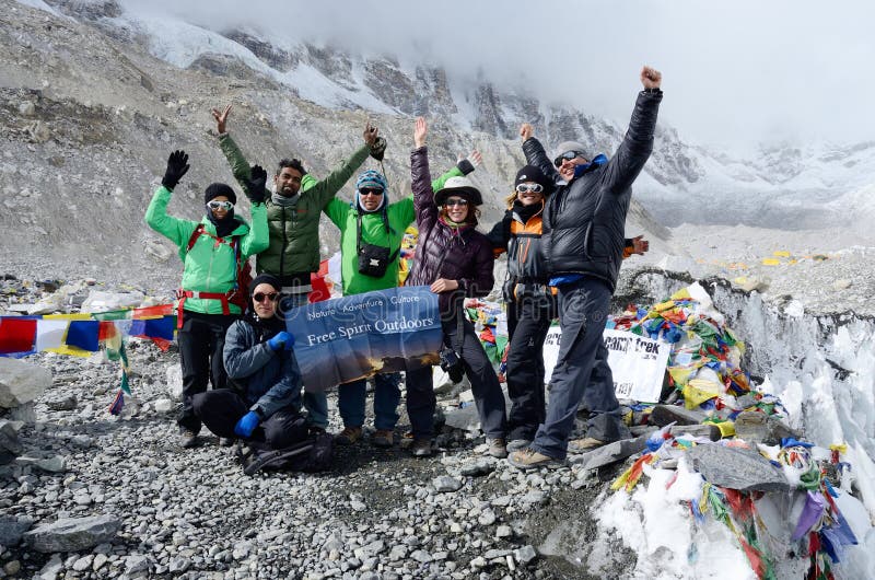 EVEREST BASE CAMP, NEPAL - APRIL 22: Unidentified hikers finishing trek to first Everest Base camp (5364 m ) on 22 April, 2013 in Everest region, Nepal. This place is final point of the Everest Base Camp Trek,one of most popular routes in the world. EVEREST BASE CAMP, NEPAL - APRIL 22: Unidentified hikers finishing trek to first Everest Base camp (5364 m ) on 22 April, 2013 in Everest region, Nepal. This place is final point of the Everest Base Camp Trek,one of most popular routes in the world