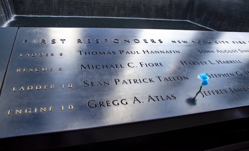 Names of several firemen that were first responders that died when the towers collapsed during the 9/11 tragedy.

The National September 11 Memorial & Museum also known as the 9/11 Memorial & Museum is a memorial and museum in New York City commemorating the September 11, 2001 attacks.The memorial is located at the World Trade Center site, the former location of the Twin Towers that were destroyed during the September 11 attacks. 

The names of 2,983 victims are inscribed on 152 bronze parapets on the memorial pools: 2,977 killed in the September 11 attacks and six killed in the 1993 World Trade Center bombing. The names are arranged based on relationships proximity at the time of the attacks, company or organization affiliations for those working at the World Trade Center or the Pentagon. Names of several firemen that were first responders that died when the towers collapsed during the 9/11 tragedy.

The National September 11 Memorial & Museum also known as the 9/11 Memorial & Museum is a memorial and museum in New York City commemorating the September 11, 2001 attacks.The memorial is located at the World Trade Center site, the former location of the Twin Towers that were destroyed during the September 11 attacks. 

The names of 2,983 victims are inscribed on 152 bronze parapets on the memorial pools: 2,977 killed in the September 11 attacks and six killed in the 1993 World Trade Center bombing. The names are arranged based on relationships proximity at the time of the attacks, company or organization affiliations for those working at the World Trade Center or the Pentagon