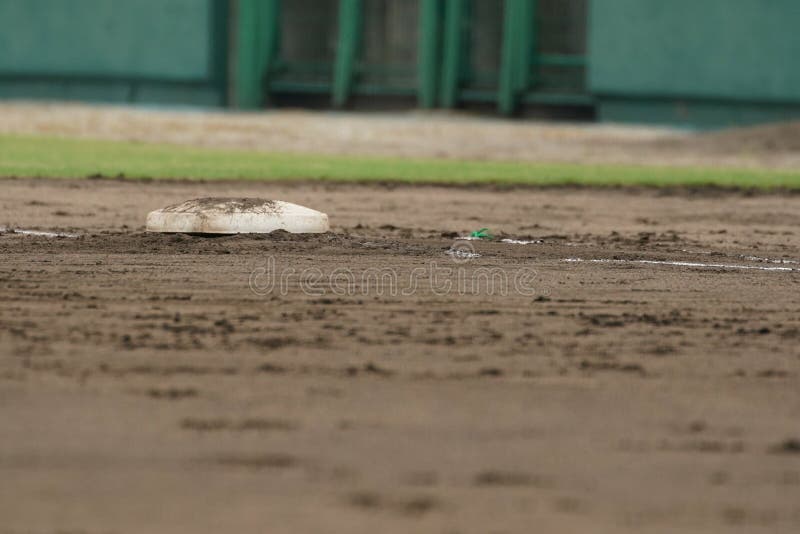 First base with dirt during a baseball game. First base with dirt during a baseball game