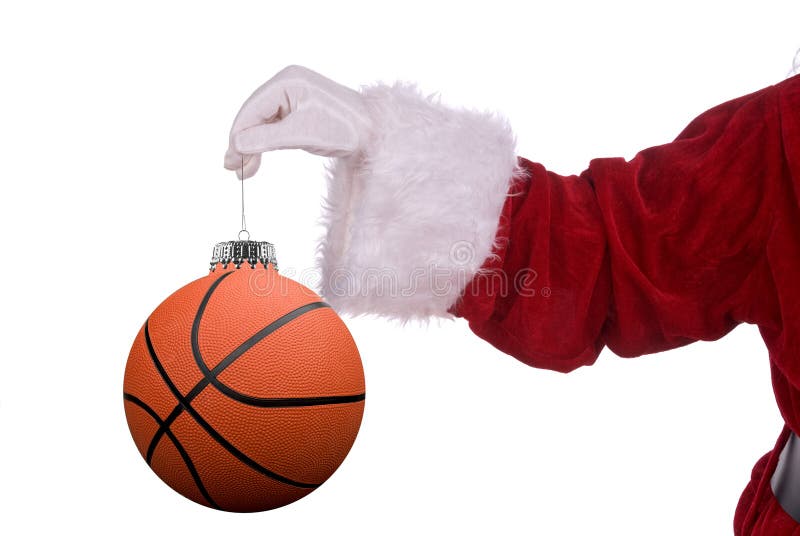 Santa Claus with basketball ornament in his white gloved hand. Santa Claus with basketball ornament in his white gloved hand