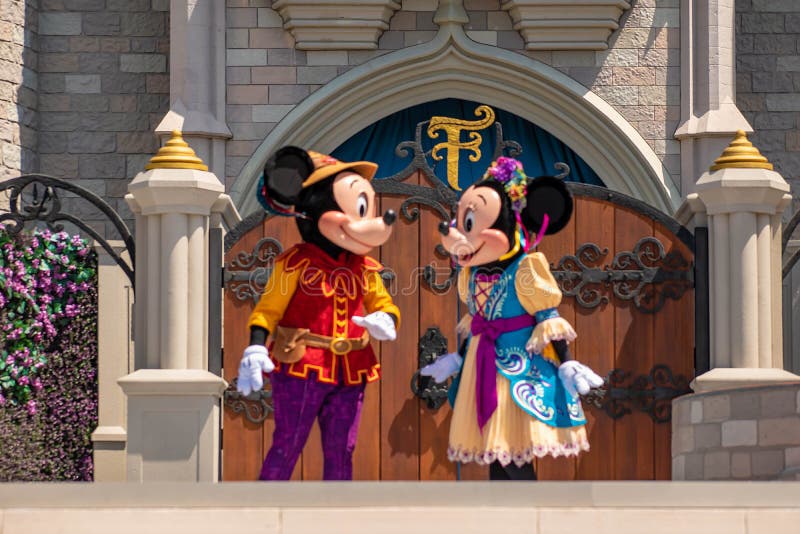 Orlando, Florida. May 10, 2019. Mickey and Minnie on Mickey`s Royal Friendship Faire on Cinderella Castle in Magic Kingdom  3. Orlando, Florida. May 10, 2019. Mickey and Minnie on Mickey`s Royal Friendship Faire on Cinderella Castle in Magic Kingdom  3