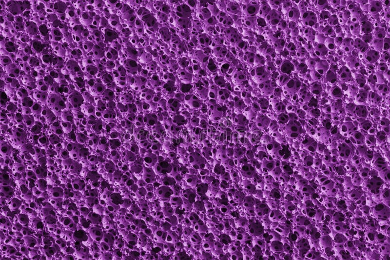 purple sponge textured patterned background for design purpose. purple sponge textured patterned background for design purpose