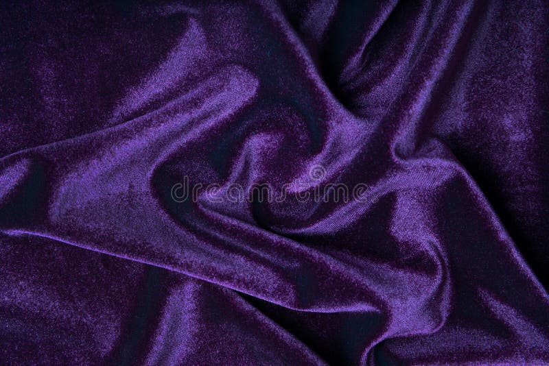 Purple velvet fabric as a background. Purple velvet fabric as a background