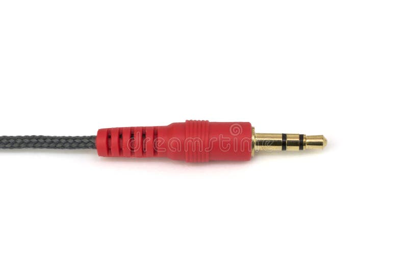 Red audio cable 3,5mm jack plug on white background. Red audio cable 3,5mm jack plug on white background.
