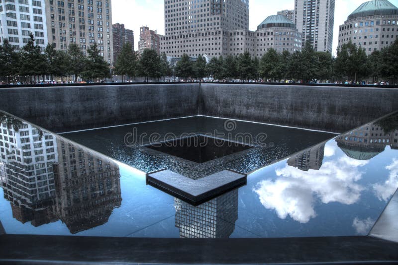 9/11 Memorial with sky reflection in New york. 9/11 Memorial with sky reflection in New york