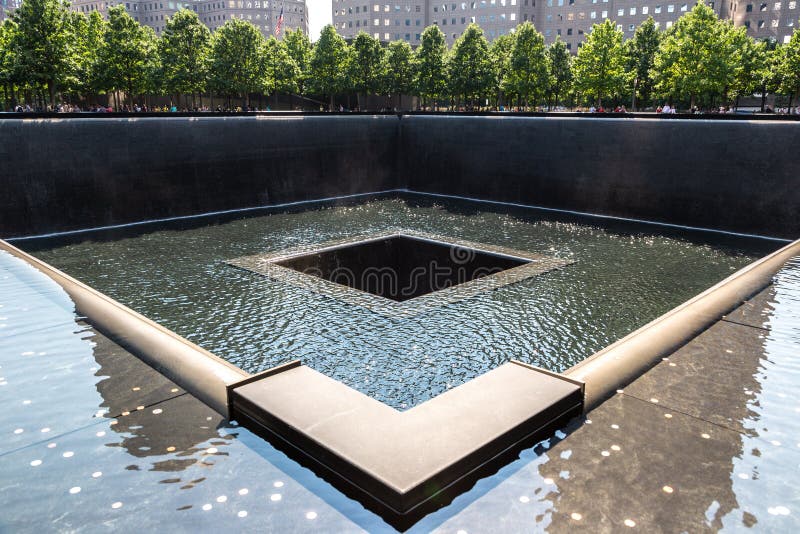 NEW YORK CITY, USA - MARCH 29, 2020: 9/11 Memorial park in New York City, NY, USA. NEW YORK CITY, USA - MARCH 29, 2020: 9/11 Memorial park in New York City, NY, USA