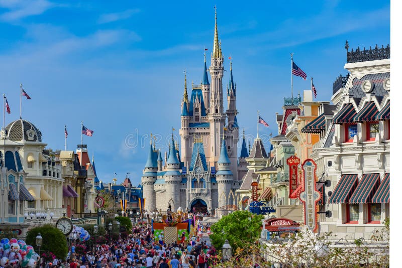 Orlando, Florida. March 19, 2019. Panoramic view of Main Street and Cinderella`s in Magic Kingdom castle at Walt Disney World  1. Orlando, Florida. March 19, 2019. Panoramic view of Main Street and Cinderella`s in Magic Kingdom castle at Walt Disney World  1