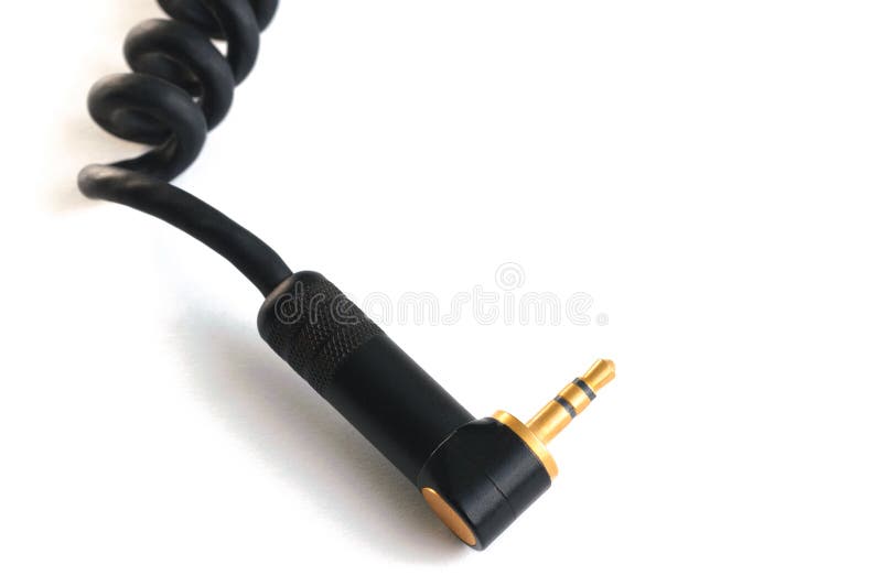 The cable audio jack 3.5mm isolated on white background. The cable audio jack 3.5mm isolated on white background