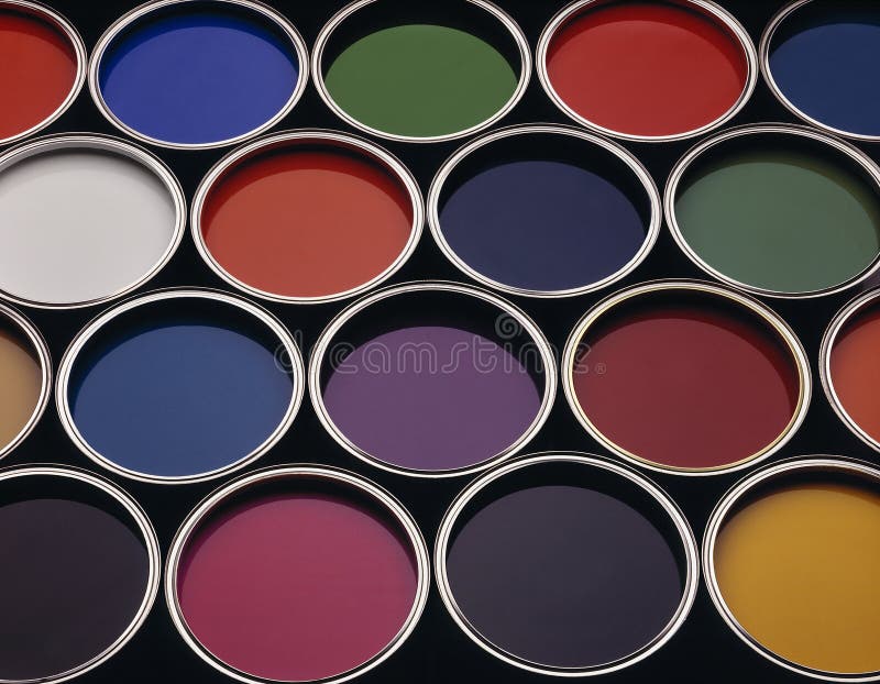 Multiple cans of coloured paint tins. Multiple cans of coloured paint tins