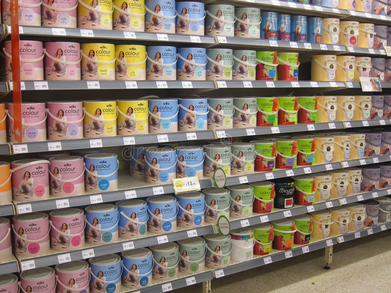 Rows of tins of paint of various colors in a do it yourself store. This display is in the Wilkinson store at Bedford, United Kingdom. Rows of tins of paint of various colors in a do it yourself store. This display is in the Wilkinson store at Bedford, United Kingdom