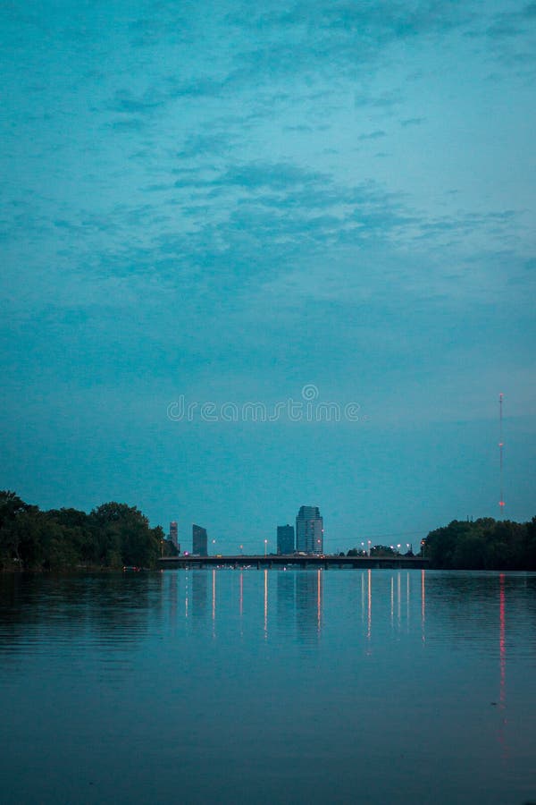 Looking over downtown Grand Rapids Michigan from a park along the Grand River. Looking over downtown Grand Rapids Michigan from a park along the Grand River