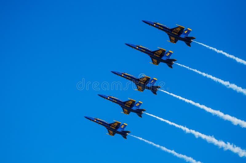 The US Navy's Blue Angle display team performing at Wings over Houston Airshow, 2014. The US Navy's Blue Angle display team performing at Wings over Houston Airshow, 2014