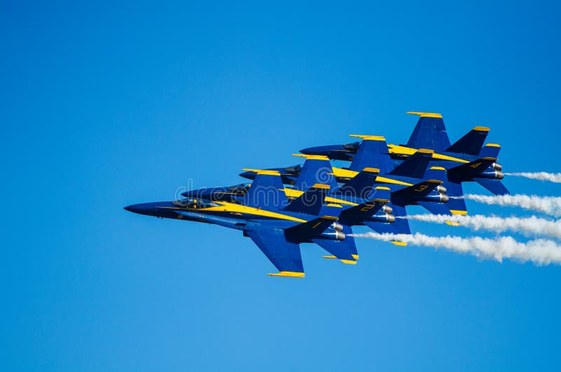 The US Navy's Blue Angle display team performing at Wings over Houston Airshow, 2014. The US Navy's Blue Angle display team performing at Wings over Houston Airshow, 2014