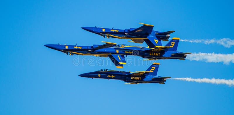 The US Navy's Blue Angle display team performing at Wings over Houston Airshow, 2014. The US Navy's Blue Angle display team performing at Wings over Houston Airshow, 2014