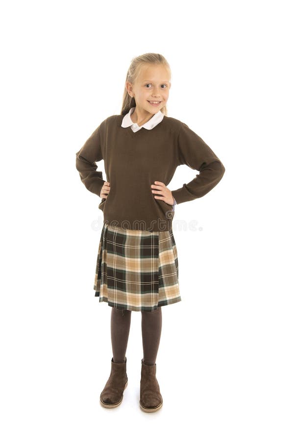 美好7或8的岁画象和愉快的在白色后面校服微笑的快乐的女小学生女孩隔绝的 免版税库存照片 美好7或8的岁画象和愉快的在白色后面校服微笑的快乐的女小学生女孩隔绝的 免版税库存照片