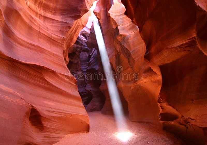 Antelope Canyon - a slot canyon in Page Arizona with shafts of noon light. Antelope Canyon - a slot canyon in Page Arizona with shafts of noon light.