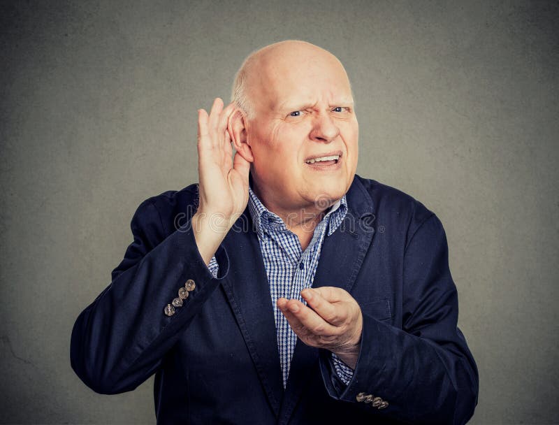 Senior man, hard of hearing,hand on ear asking to speak up. Senior man, hard of hearing,hand on ear asking to speak up