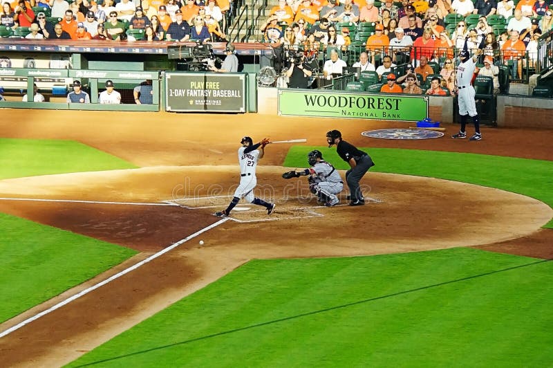 Jose Altuve in the baseball game in 2018 between Houston Astros and Boston Red Sox, 2 teams in the top 8 standing held in Minute Maid Park arena, Houston. Among the top players who played were A Benintendi, X Bogaerts, and JD Martinez of the Red Sox and C Correa and Y Gurriel of the Astros. Jose Altuve in the baseball game in 2018 between Houston Astros and Boston Red Sox, 2 teams in the top 8 standing held in Minute Maid Park arena, Houston. Among the top players who played were A Benintendi, X Bogaerts, and JD Martinez of the Red Sox and C Correa and Y Gurriel of the Astros.