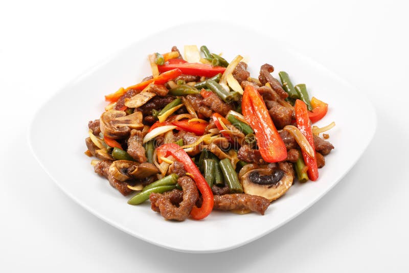 肉用中文,猪肉,中国调味汁,蘑菇,青豆,甜椒 库存照片 肉用中文,猪肉,中国调味汁,蘑菇,青豆,甜椒 库存照片