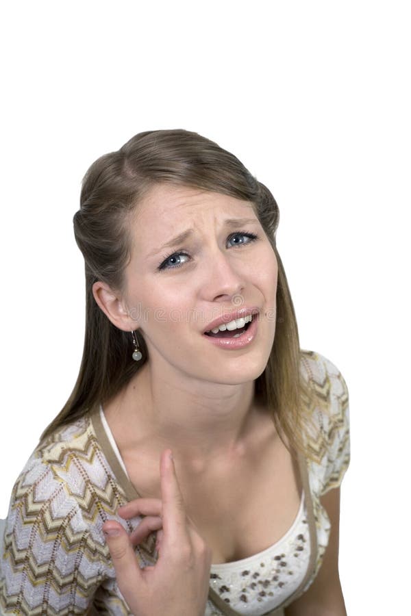 Studio image of girl against a plain background gesturing she can't hear. She was 19 at the time of shoot and is of Irish ethnicity. For release 3a. Studio image of girl against a plain background gesturing she can't hear. She was 19 at the time of shoot and is of Irish ethnicity. For release 3a