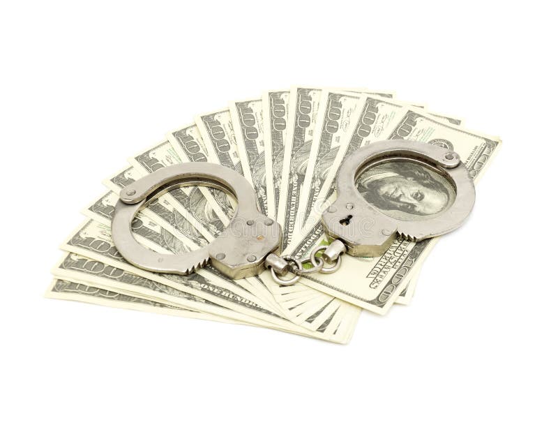 Handcuffs on money background, business security concept. Handcuffs on money background, business security concept