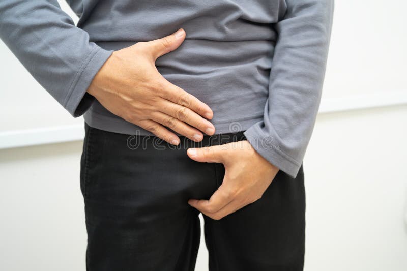 腹痛腹痛与疝气泌尿健康 库存图片
