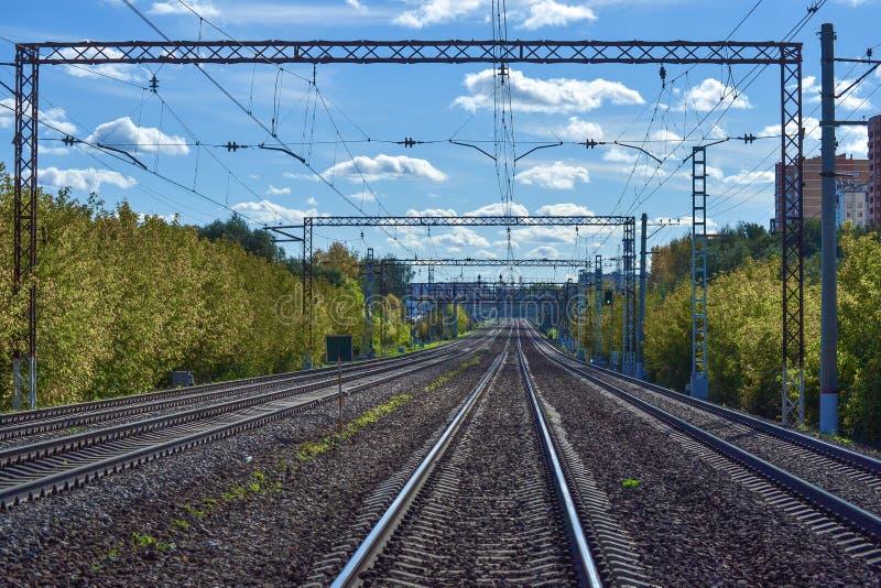 A lot of railway tracks stretching into the distance. Electrified road. Moscow region, Russia. A lot of railway tracks stretching into the distance. Electrified road. Moscow region, Russia.