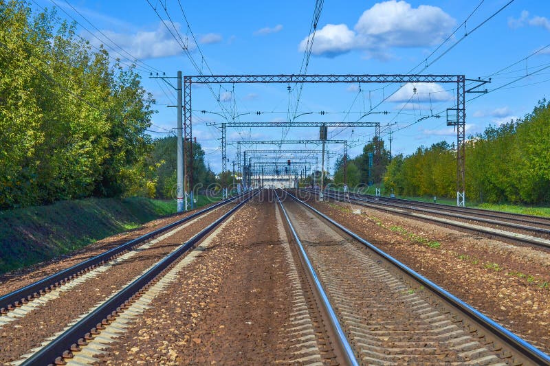 A lot of railway tracks stretching into the distance. Electrified road. Moscow region, Russia. A lot of railway tracks stretching into the distance. Electrified road. Moscow region, Russia.