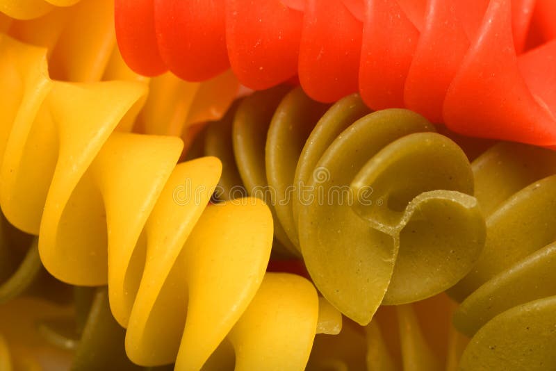 A colourful design using spiral pasta. A colourful design using spiral pasta.