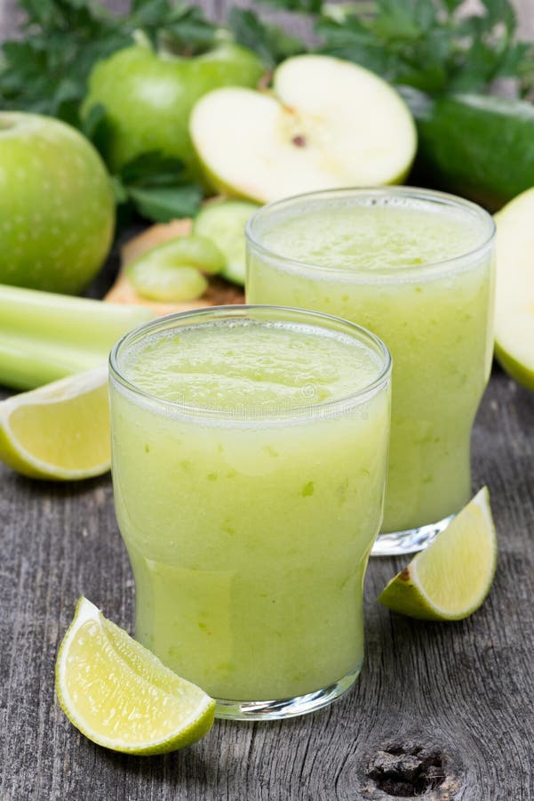 Smoothies of green apple, celery and lime, vertical. Smoothies of green apple, celery and lime, vertical