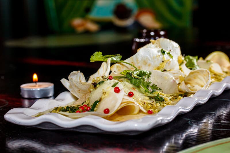 Salad of fresh celery root and Apple is on the plate. Salad of fresh celery root and Apple is on the plate