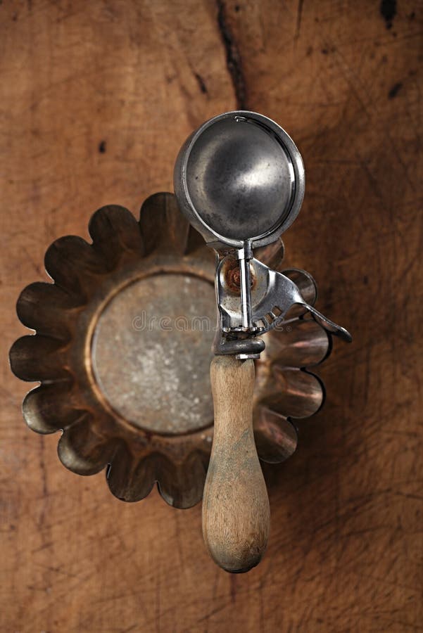 Vintage Baking utensils - spatula, tins and moulds on wooden board. Vintage Baking utensils - spatula, tins and moulds on wooden board